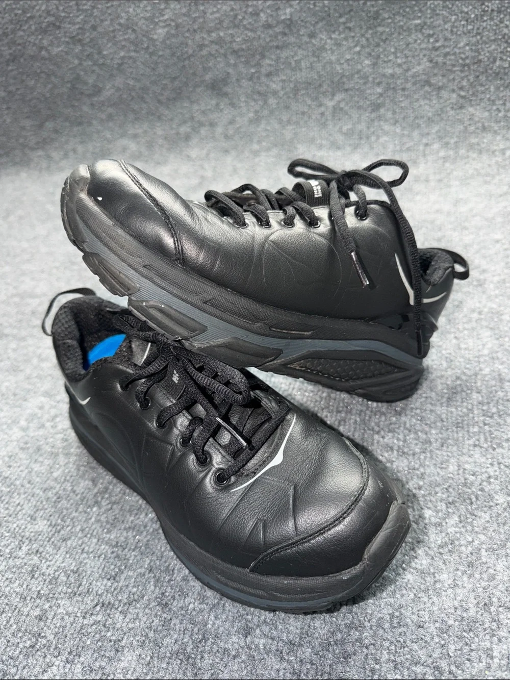 Hoka One One Black leather Walking Sneakers with Blue Lining